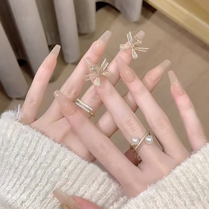 Artificial nail set with elegant 3D patterns and delicate accents Bowlift
