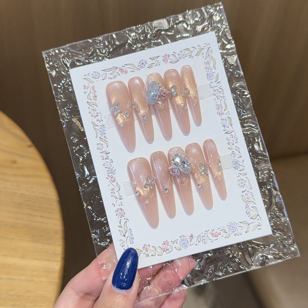 Artificial nails with romantic floral and glitter details Bowlift