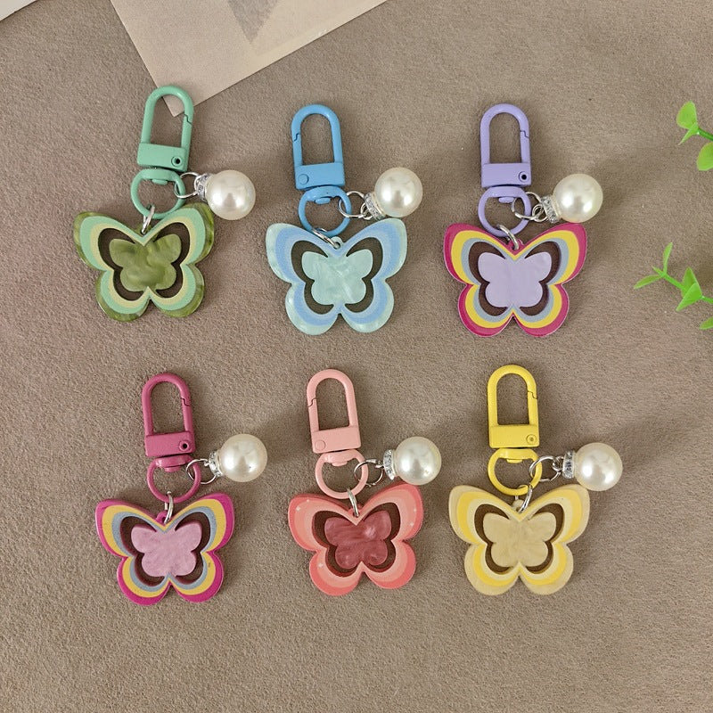 Keychain with butterfly and pearl accent Bowlift