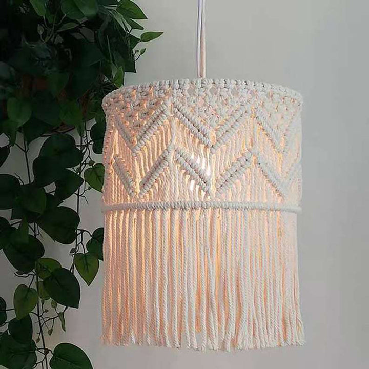 Macrame plant hanger with decorative fringes