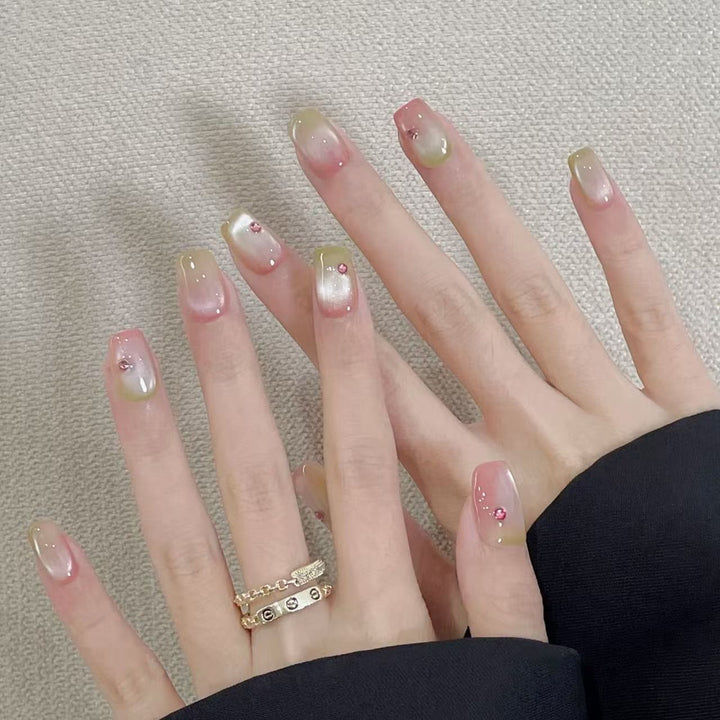 Artificial artificial nails with elegant ombre effects and glitter accents Bowlift