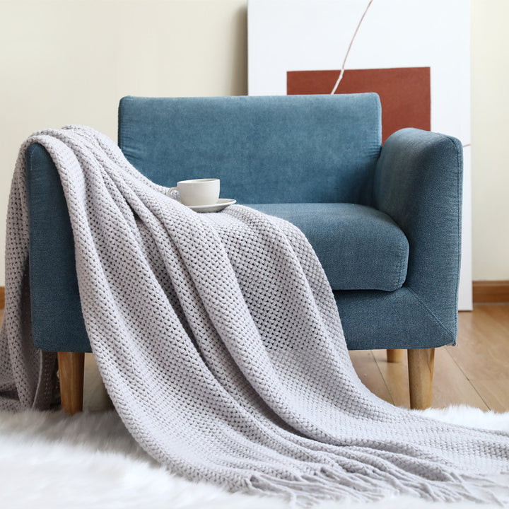 Women cozy knit blanket with decorative pattern Bowlift