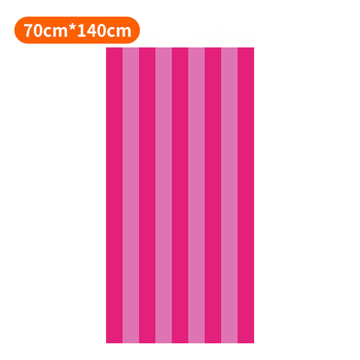 Beach towel with colorful stripe pattern Bowlift