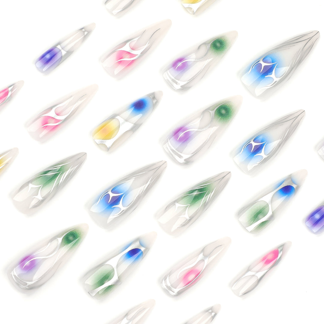 Artful stiletto nails with transparent design and colorful accents Bowlift