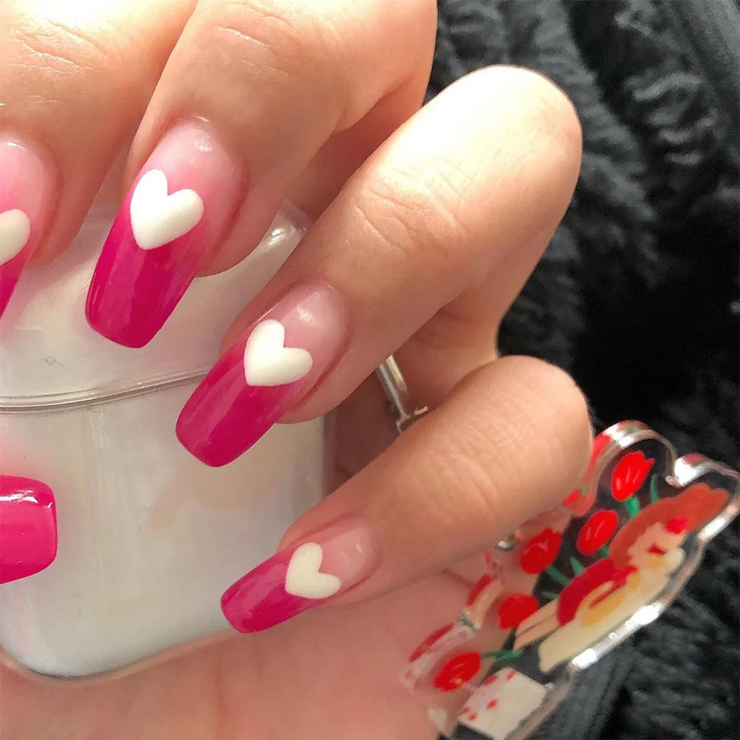 Artful nail extensions in romantic heart design Bowlift