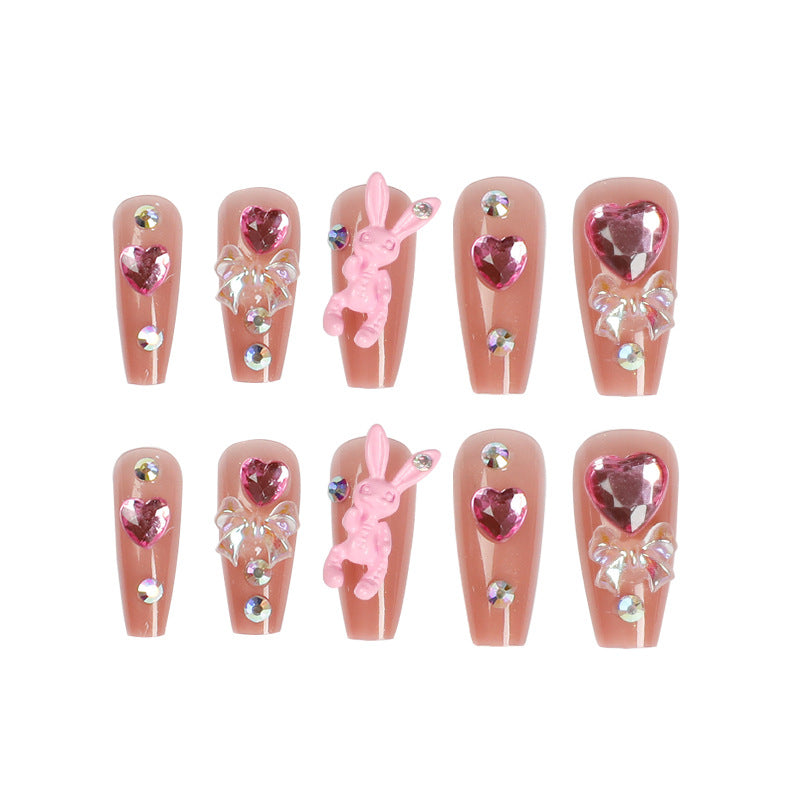 Artificial nail extensions with artistic decorations Bowlift