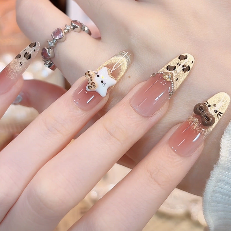 Glamorous artificial nails with creative embellishments Bowlift