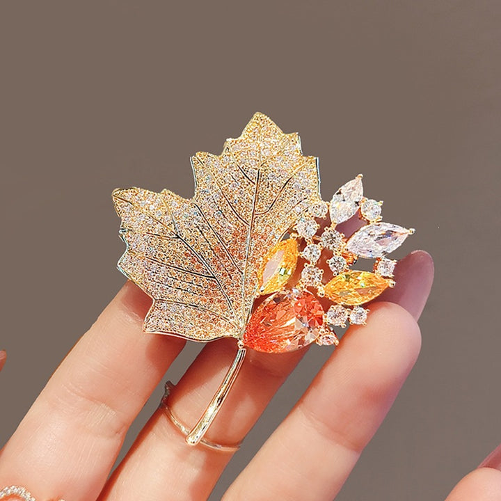 Exquisite leaf brooch with sparkling crystals Bowlift