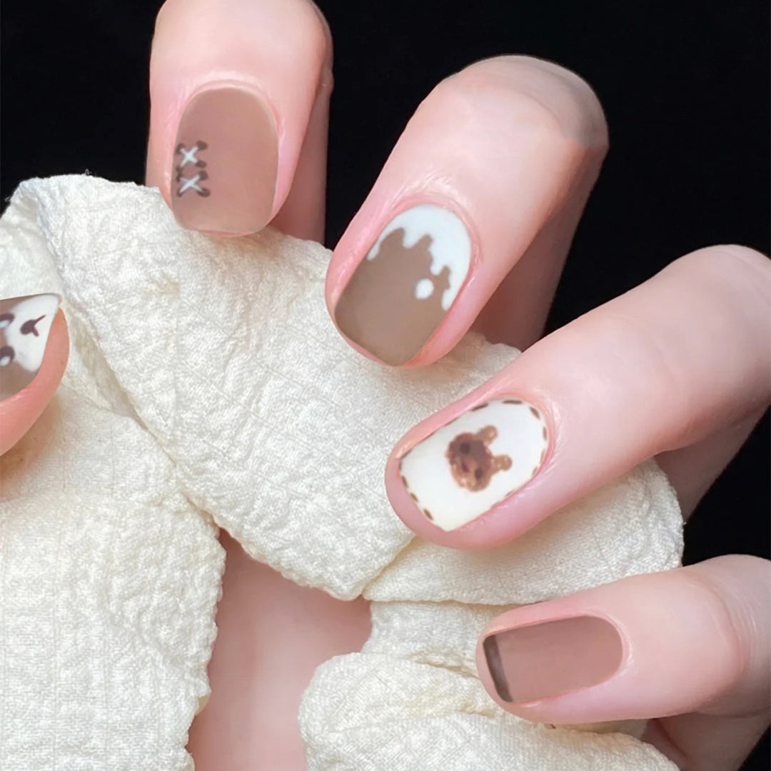 Artful nail art with bear motif Bowlift