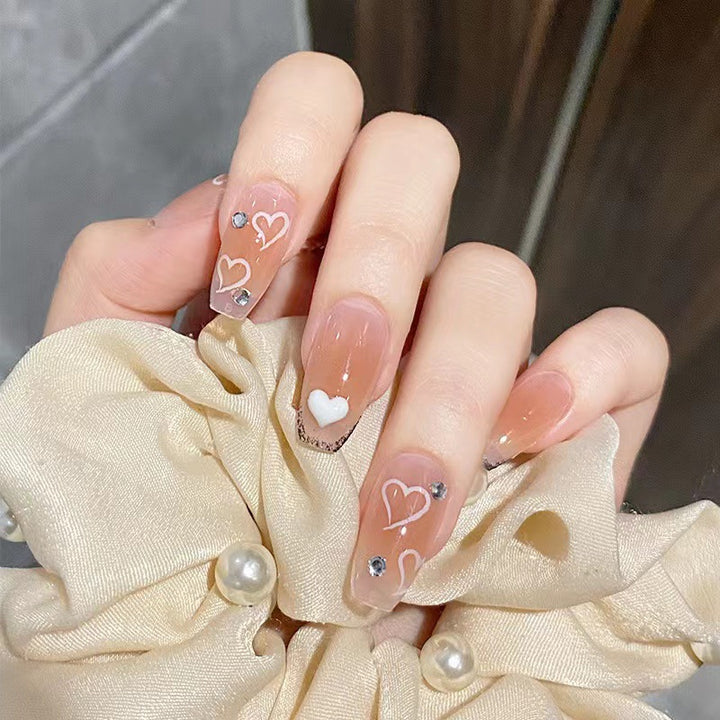 Artful nail tips in heart design Bowlift