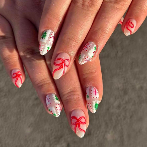 Artificial nail set with festive gift and bow motifs Bowlift