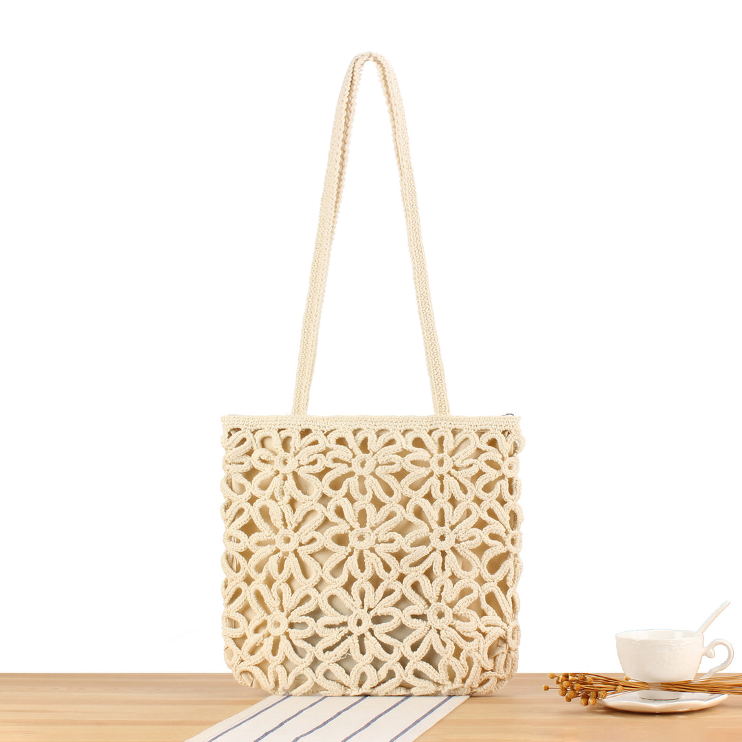 Handbag made of artistic macramé with floral details Bowlift