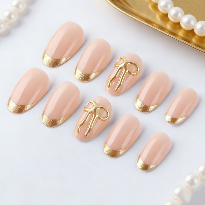 Elegant Gold-Trimmed Press-On Nail Art Bowlift