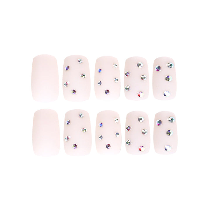 Artistic nail art with elegant rhinestone embellishments Bowlift