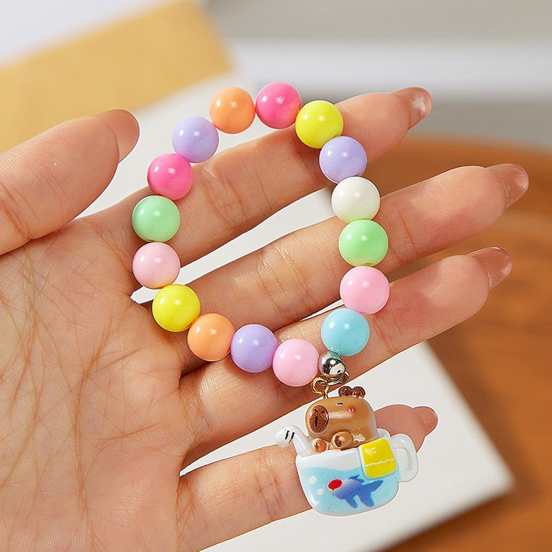 Colorful children's bracelet with crafted pendant Bowlift
