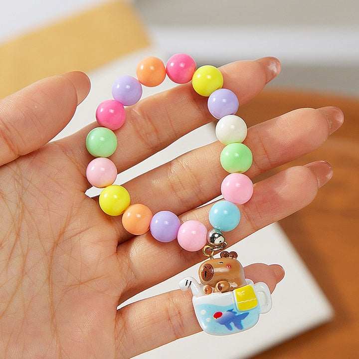 Colorful children's bracelet with crafted pendant Bowlift