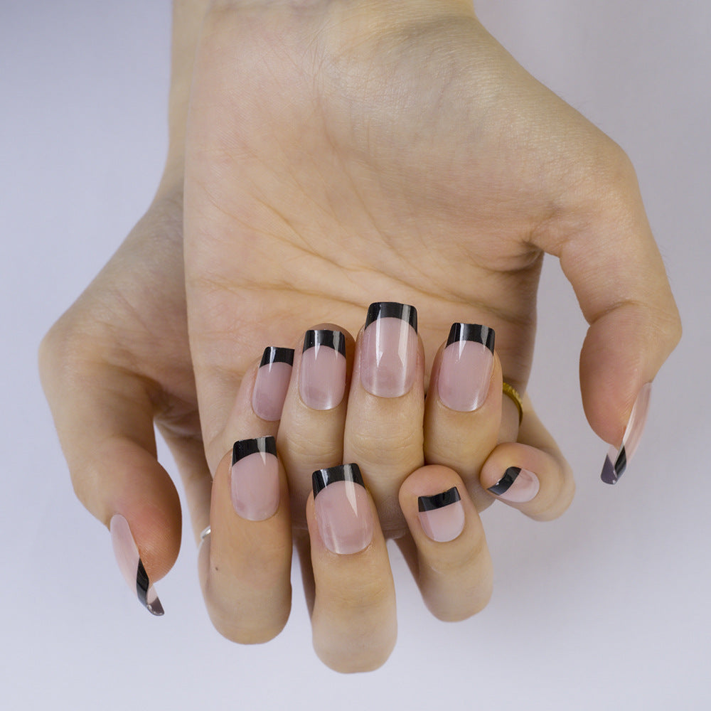 Artificial Nails in Elegant French Design with Glittering Accents Bowlift