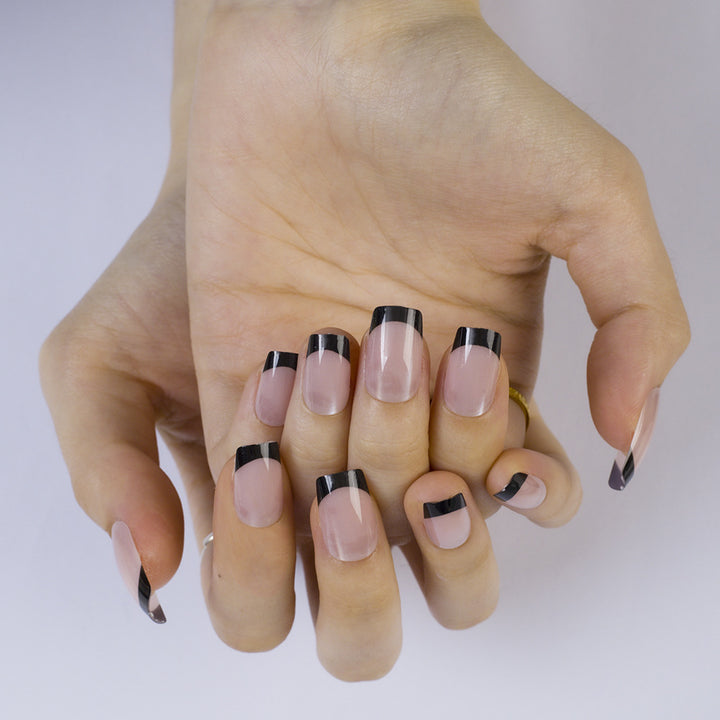 Artificial Nails in Elegant French Design with Glittering Accents Bowlift