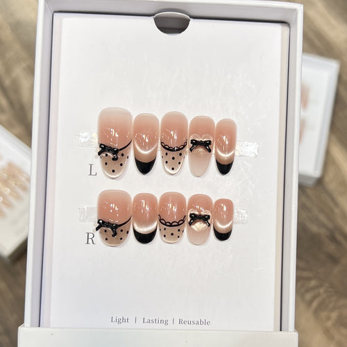 Elegant Reusable Press-On Nail Art Set with Charming Bow Accents Bowlift