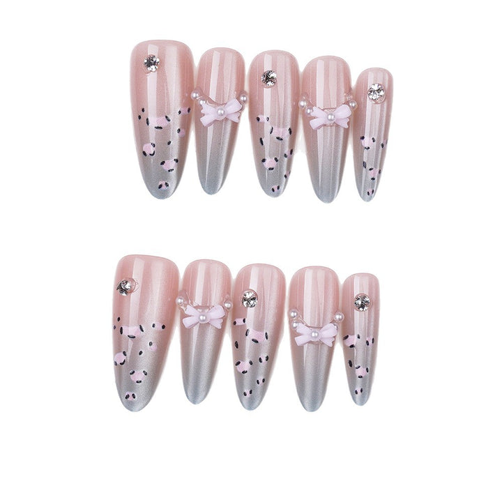 Artistic Stiletto Press-On Nail Set with Leopard Print and Bow Accents Bowlift