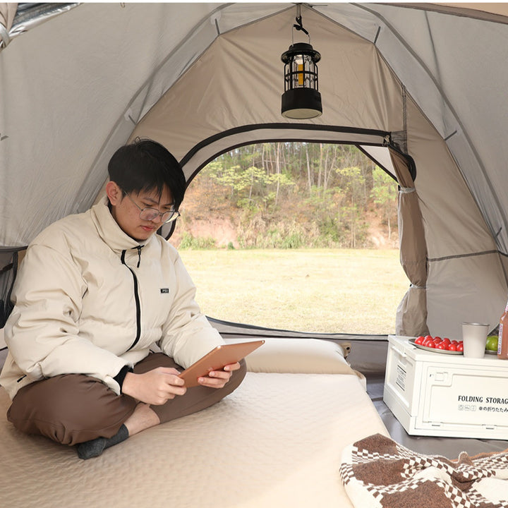 double connectable inflatable camping mattress with integrated dual pillows, egg-crate comfort surface and compact carry sack Bowlift