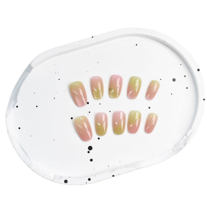 Artificial nails with elegant ombre effect and glitter accents Bowlift