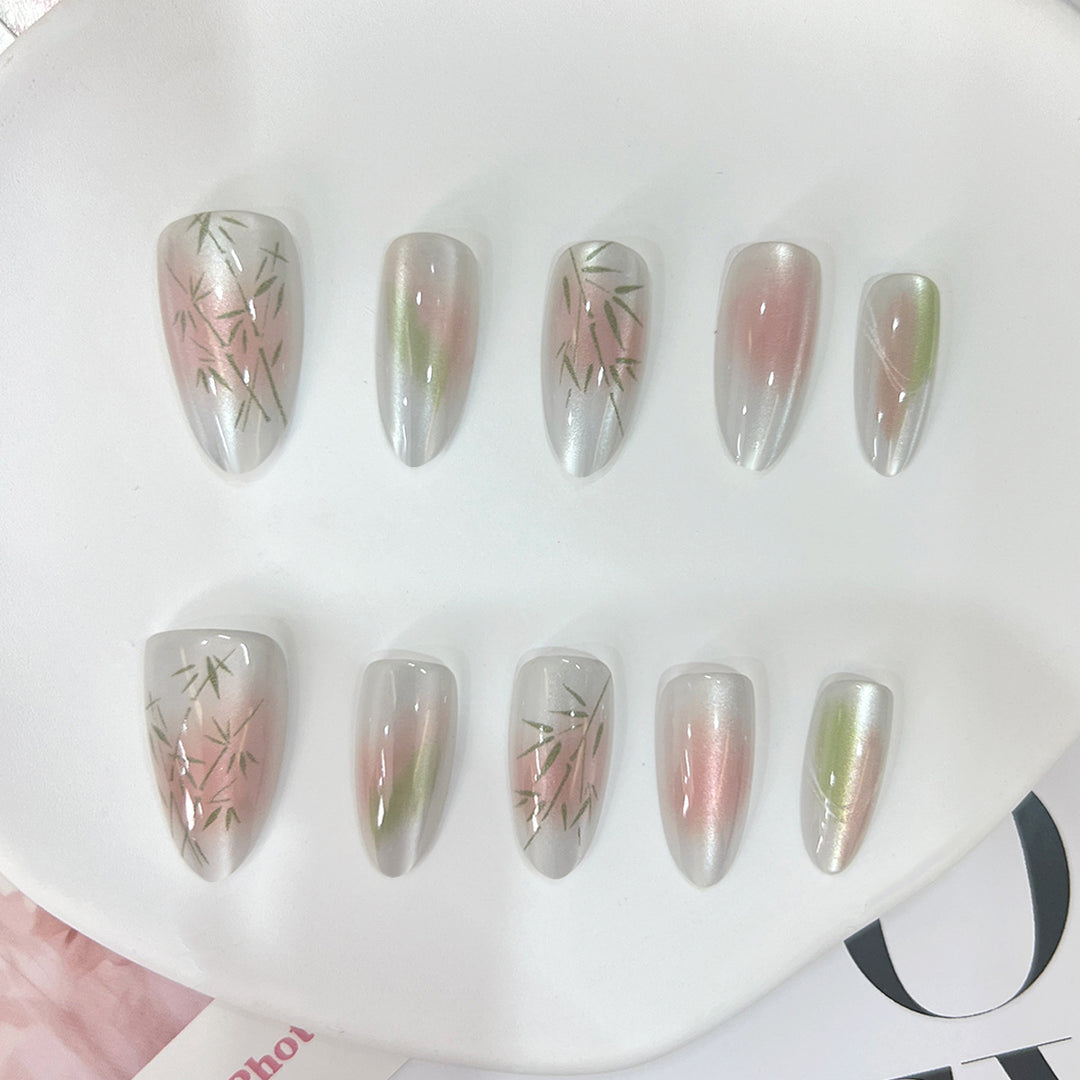 Artificial nail tips with elegant design and botanical accents Bowlift