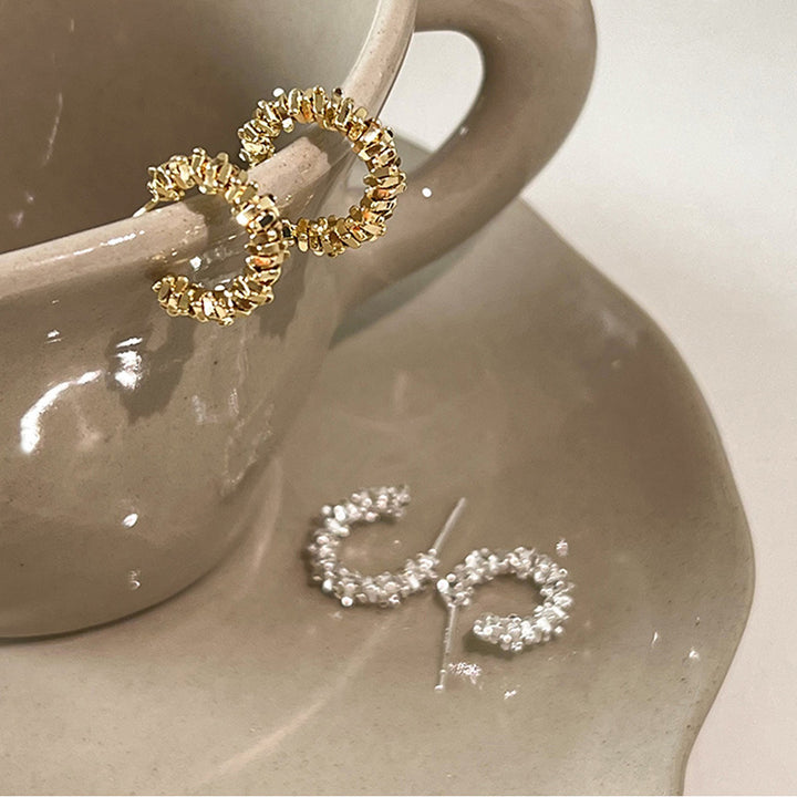 Sparkling hoops with sparkling details Bowlift