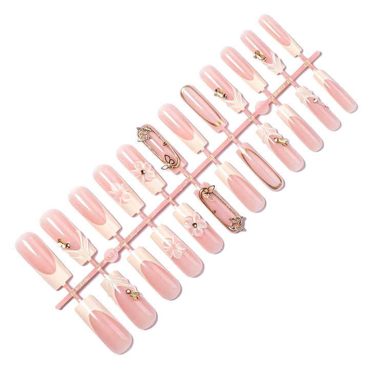 Artificial nail set with floral engravings and elegant embellishments Bowlift