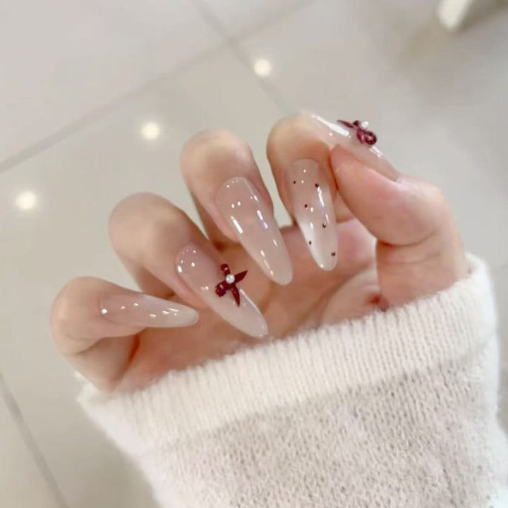 Elegant Stiletto Press-On Nails with Decorative Accents Bowlift