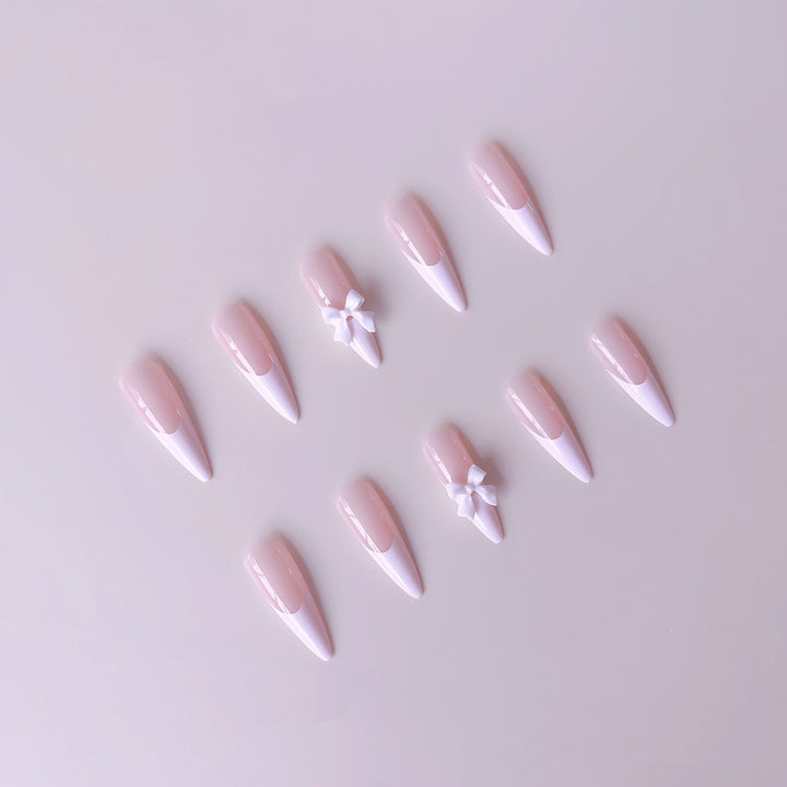Acrylic nail set with elegant tips and 3D decorations Bowlift