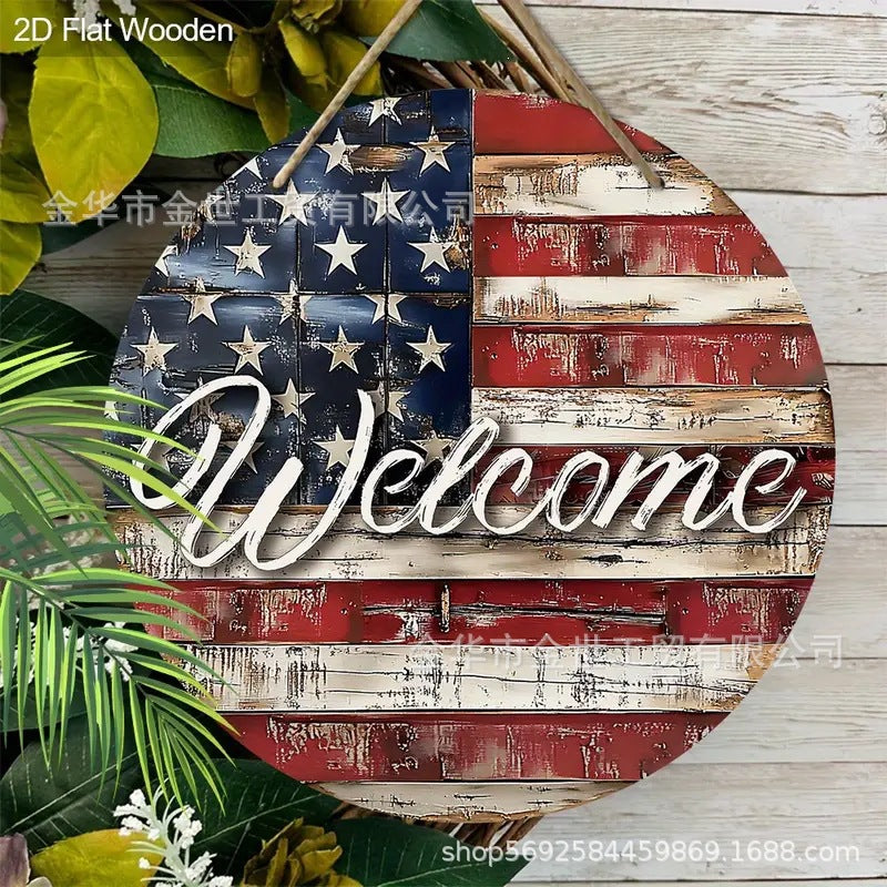 Independence Day rustic round wooden patriotic cross wall plaque with floral accents and God Bless America banner Bowlift