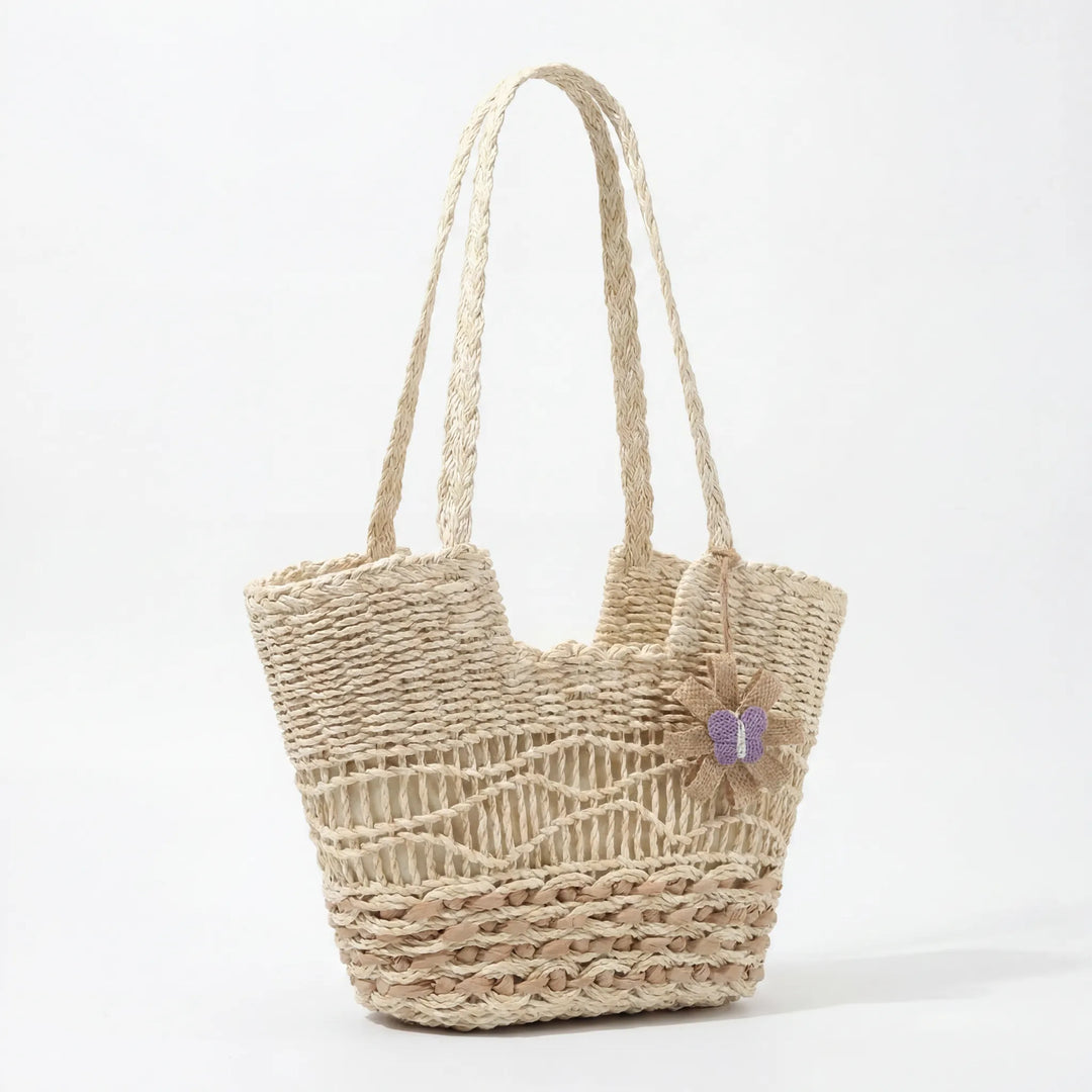 Handwoven straw bag with unique flower detail Bowlift