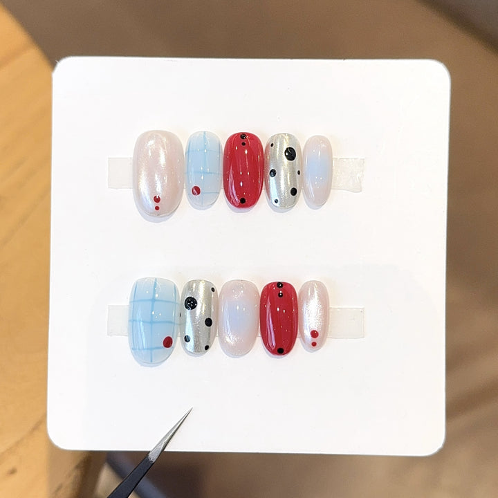 Artificials nails with creative geometric design and modern accents Bowlift