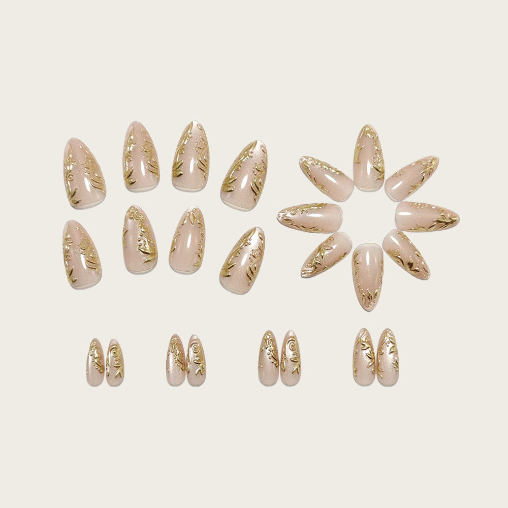 Exquisite artificial nails with golden decorations Bowlift