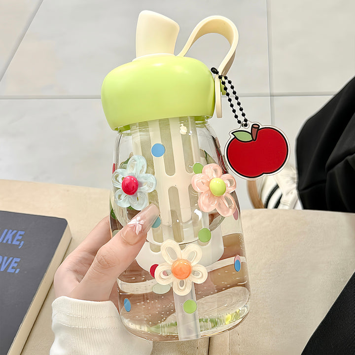 Women's water bottle with integrated fruit filter and practical carrying handle Bowlift