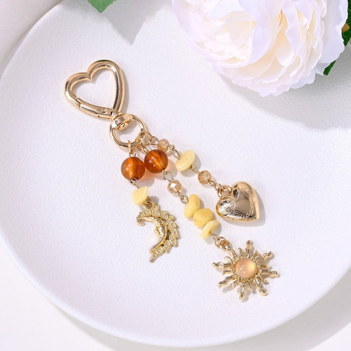 Keychain with Sparkling Sun Motif Bowlift