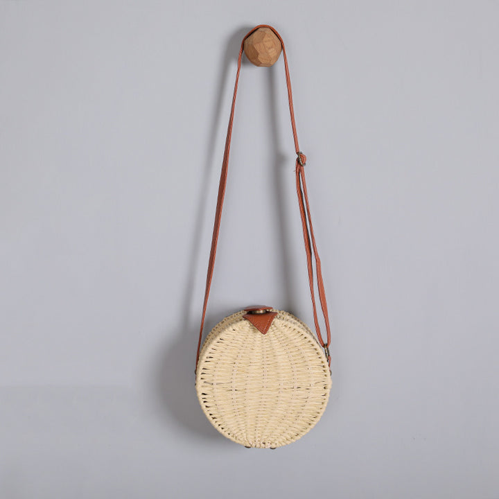 Round basket bag with leather accents Bowlift