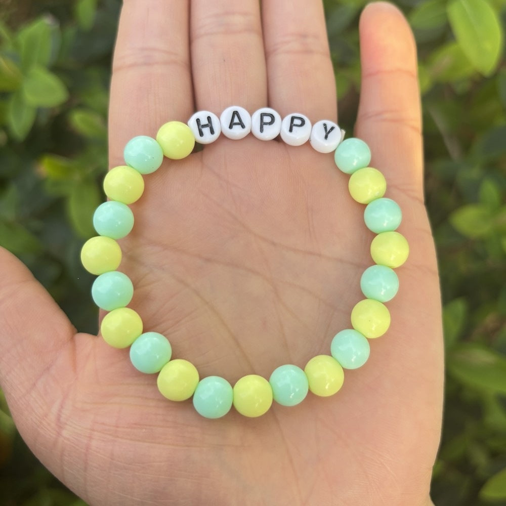 Friendship bracelet made of pastel beads Bowlift