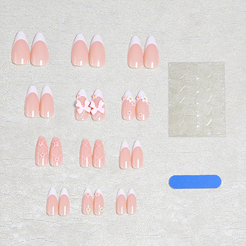Artful Nail Tips with Ribbons and Floral Decorations Bowlift