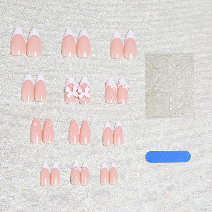 Artful Nail Tips with Ribbons and Floral Decorations Bowlift