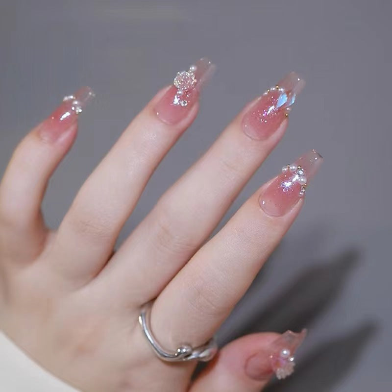 Artificial nails with heart design and glitter accents Bowlift