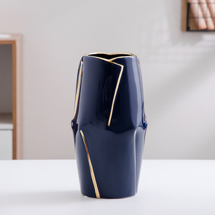 Decorative ceramic vase with golden accents Bowlift