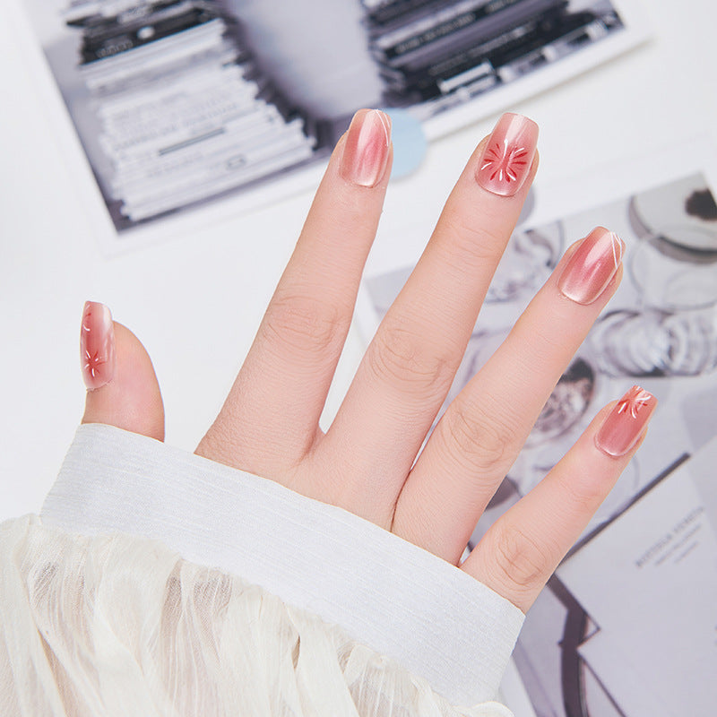 Artistic nail extensions with floral accents Bowlift