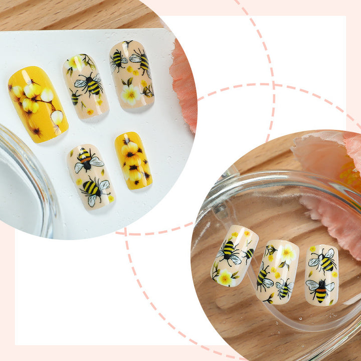 Artificial nail set with floral and bee motifs Bowlift