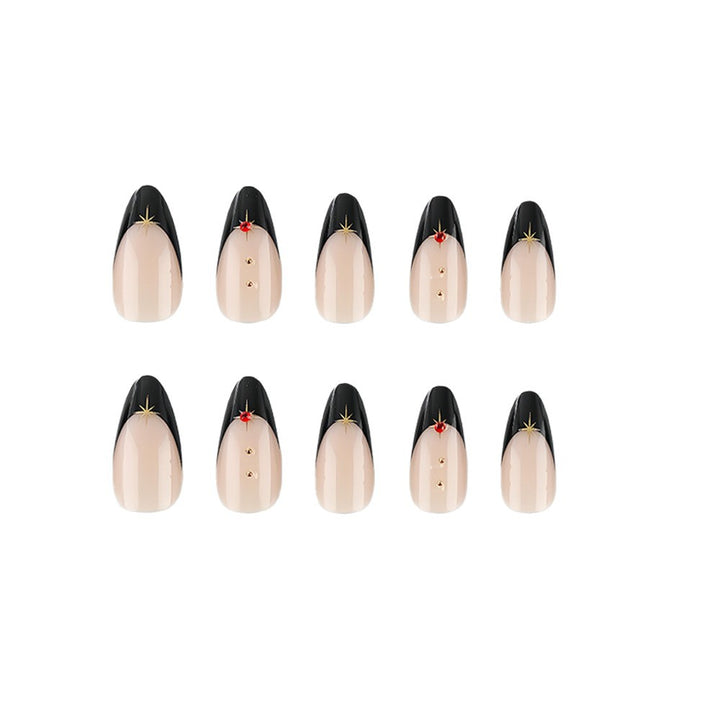 Glamorous artificial nails in stylish stiletto design with golden accents Bowlift