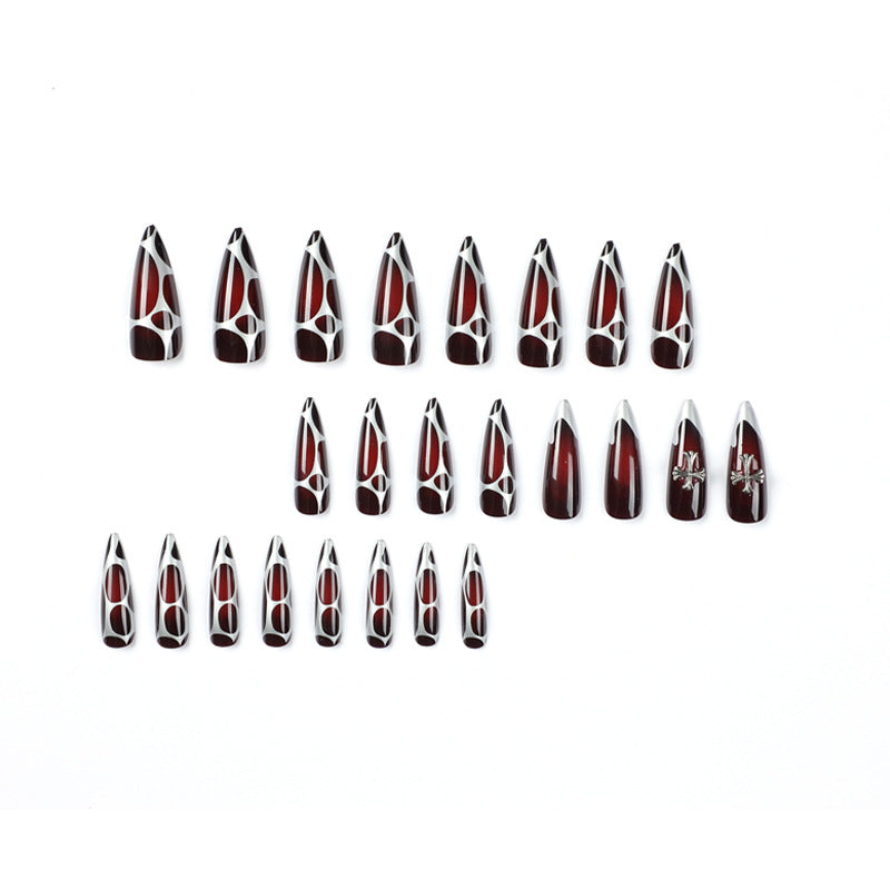 Artful Stiletto Nails with Elegant Cross Decoration Bowlift