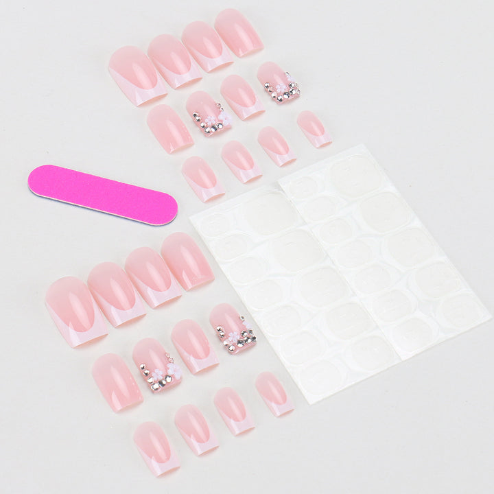 Press-On Nail Set with French Tip Design and Floral Accents Bowlift