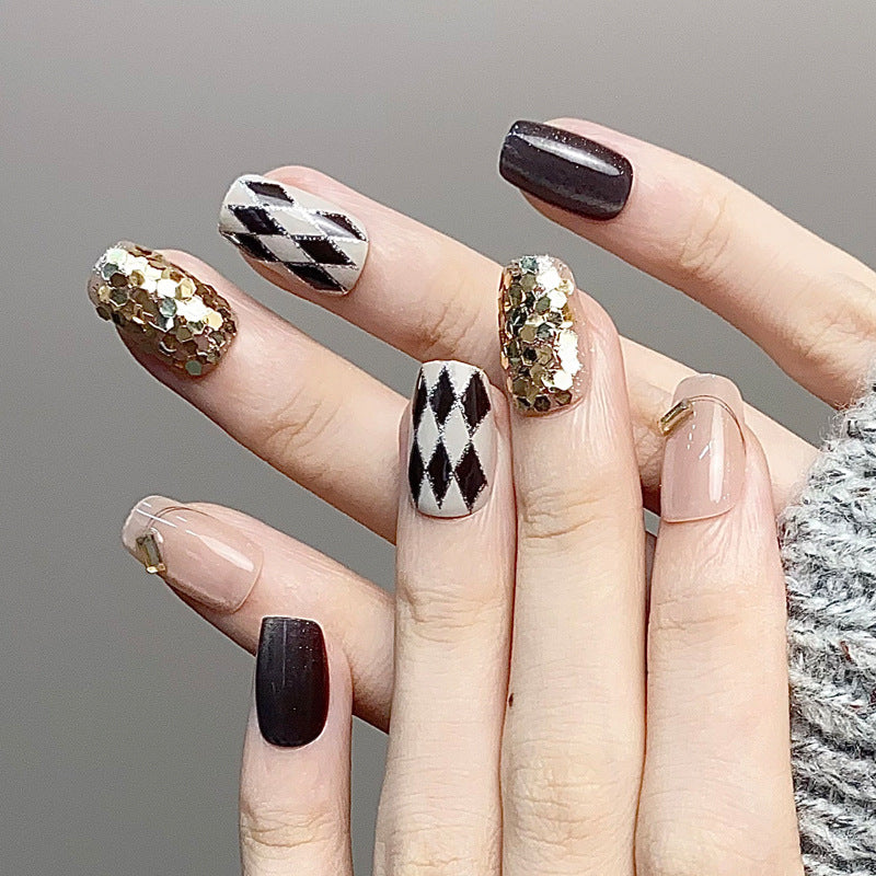 Glamorous Press-On Nail Set with Decorative Gemstone Accents Bowlift