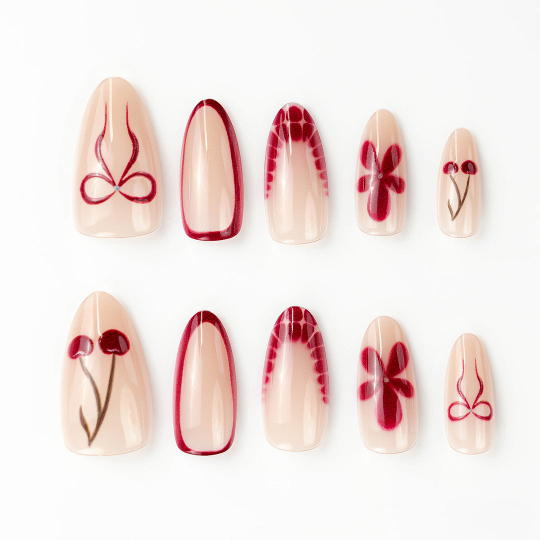 Artificial nails with floral design and elegant accents Bowlift